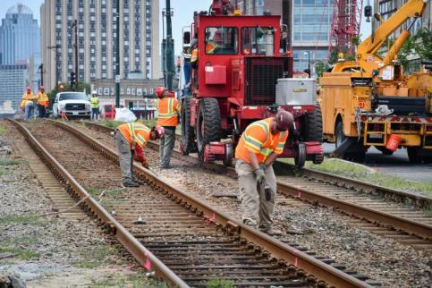 Work crew on the eastbound side of Comm Ave Bridge