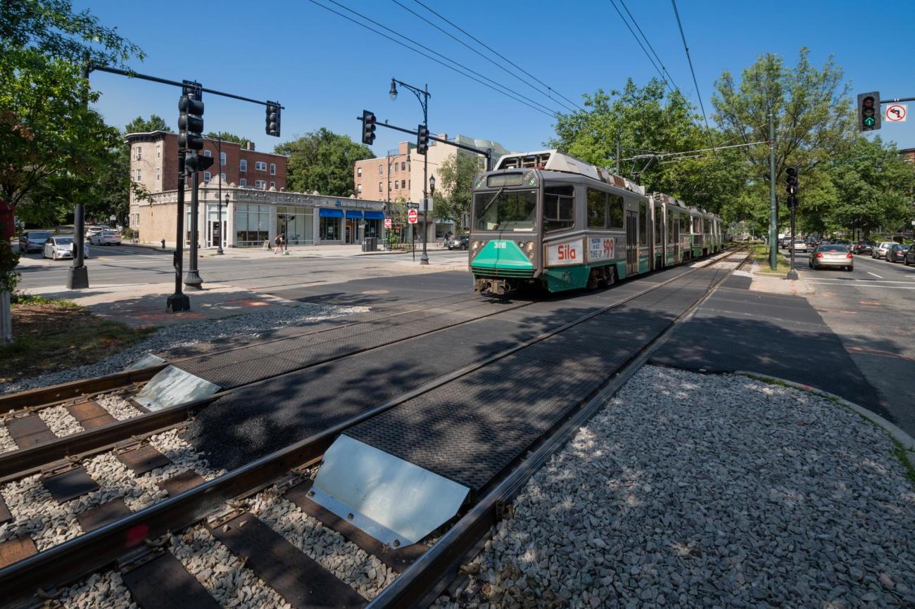 A Green Line train passes over a newly completed intersection upgrade on the C Branch at Carlton St (July 2019)