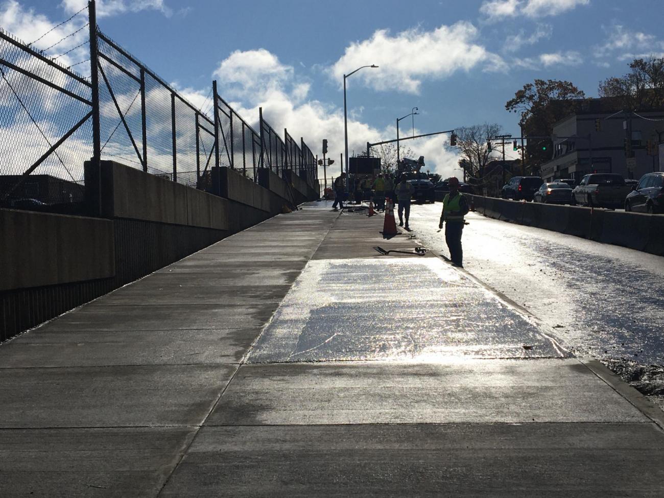 The new sidewalk at Wollaston Station along Newport Ave looking southbound (October 2019)