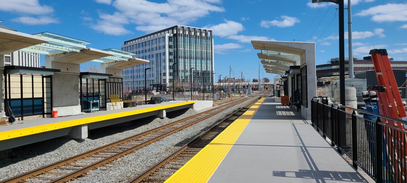 The new Chelsea Commuter Rail Station with inbound and outbound platforms, canopies, and glass panels installed