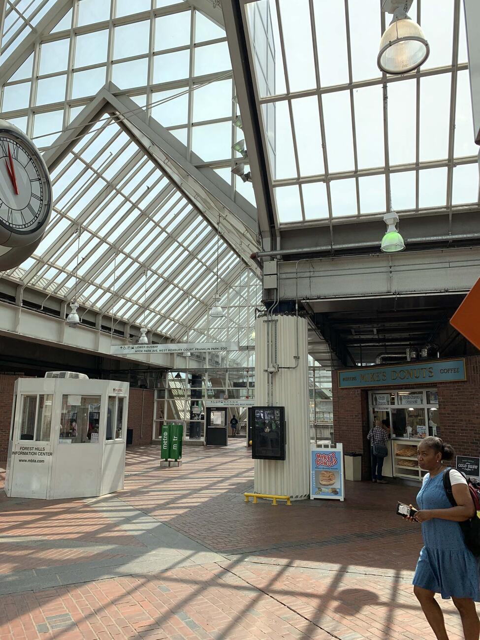 The Forest Hills Station lobby. The information kiosk and big station clock are in the photo