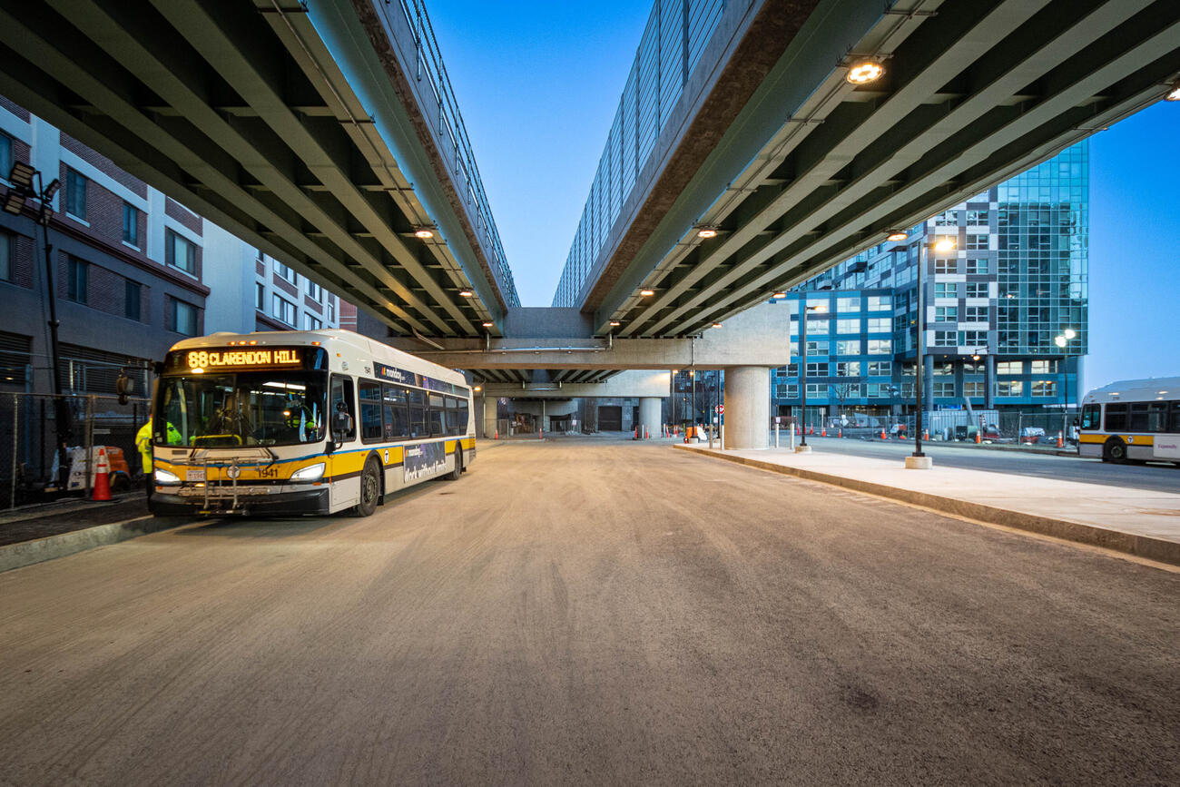 A Route 88 bus stops at the Lechmere busway (March 2022)