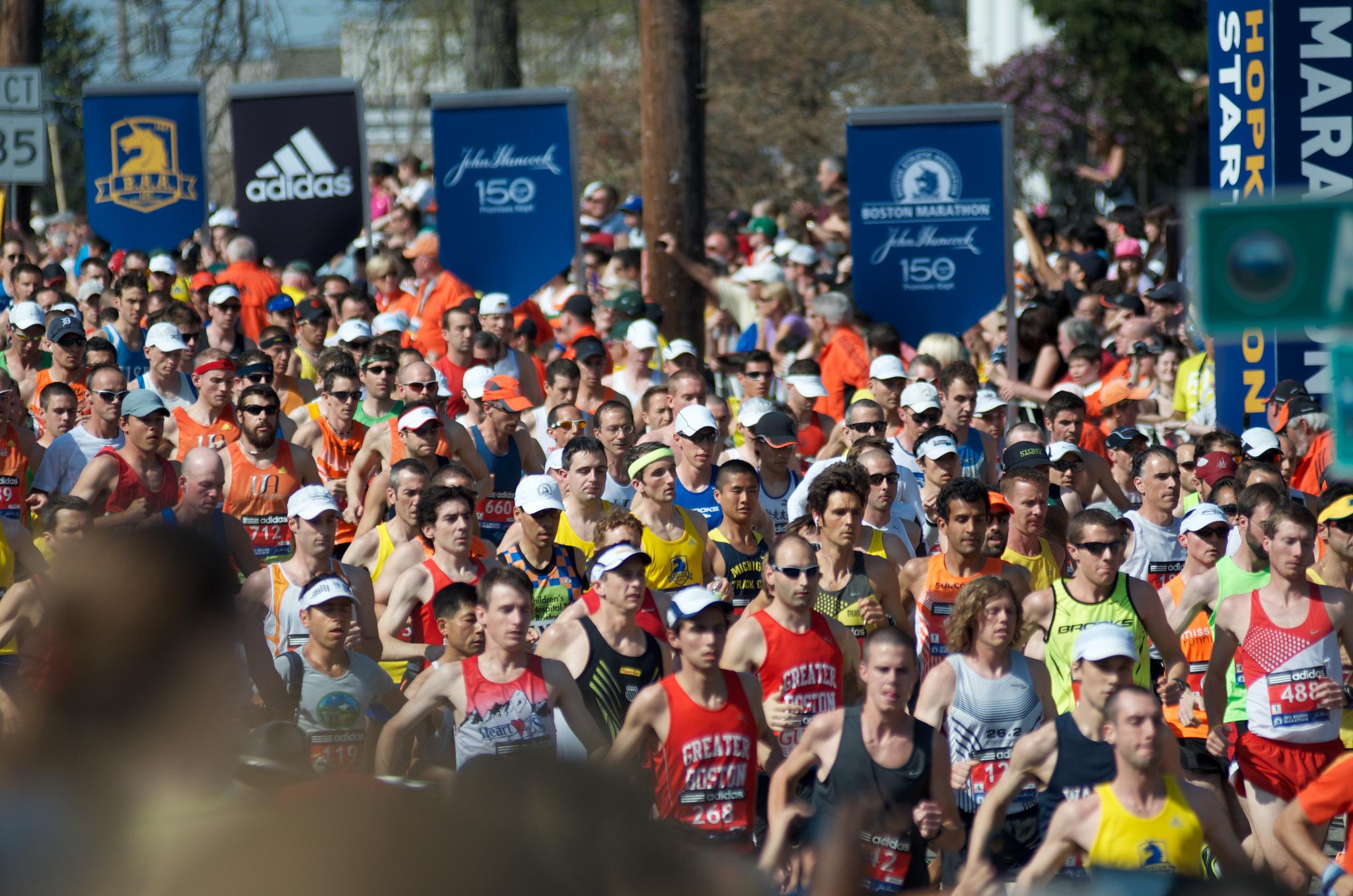 Runners in the 116th Boston Marathon take off with the starting gun at the starting line in Hopkinton. Photo by Ryan Hutton, Boston University News Service, made available by BU Interactive News on Flickr (CC BY 2.0)