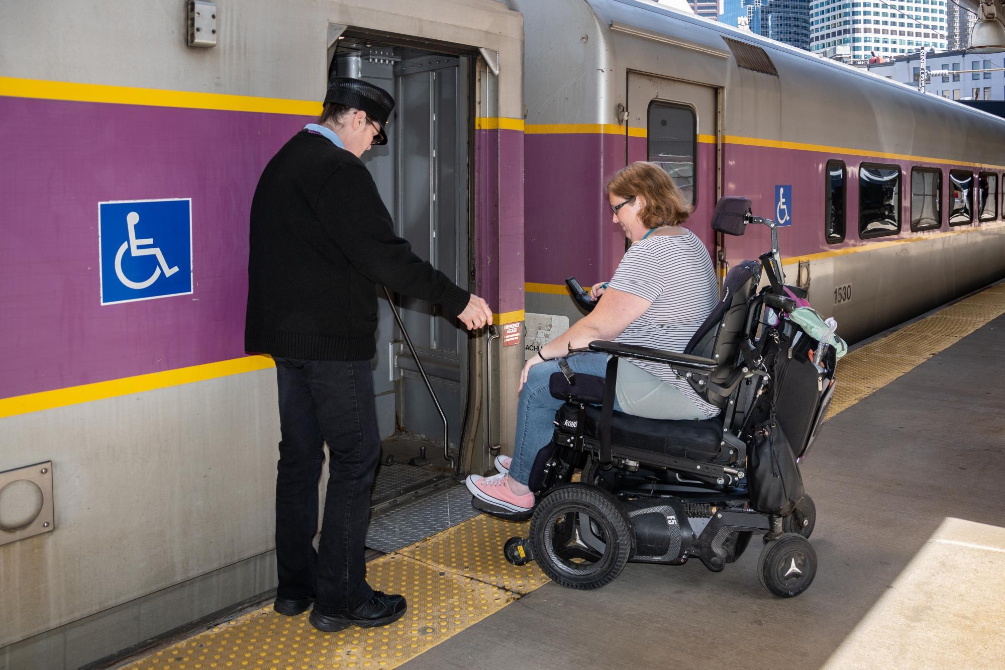 customer boarding commuter with bridge plate