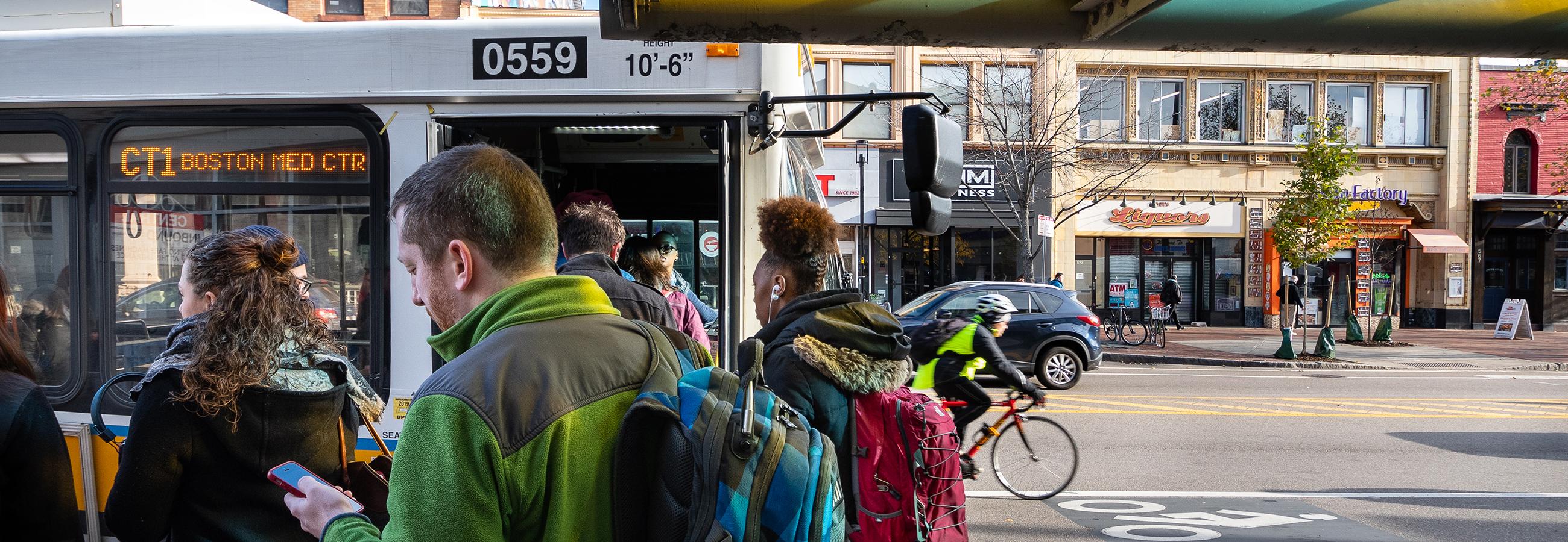 Passengers boarding bus