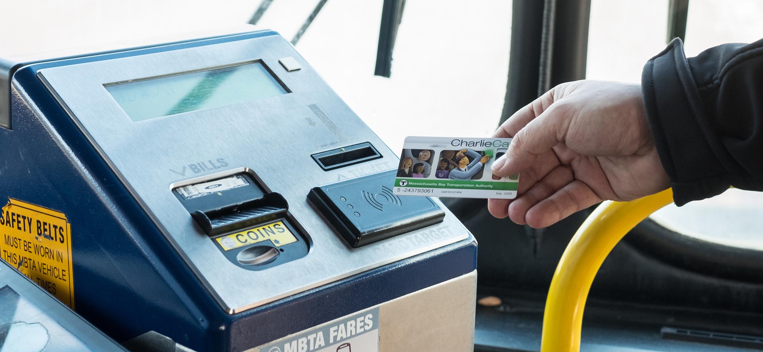 customer paying fare with charliecard