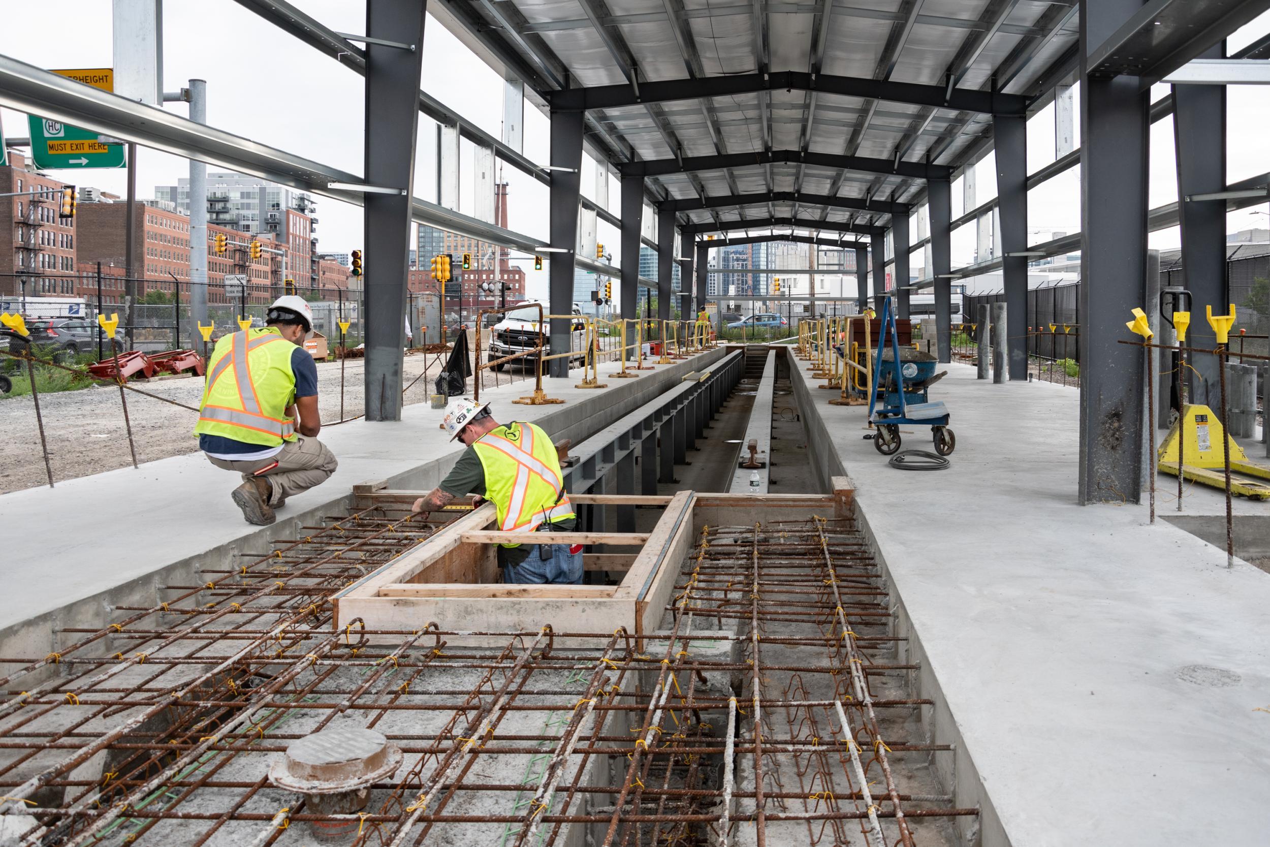 A crew works on constructing a new storage facility