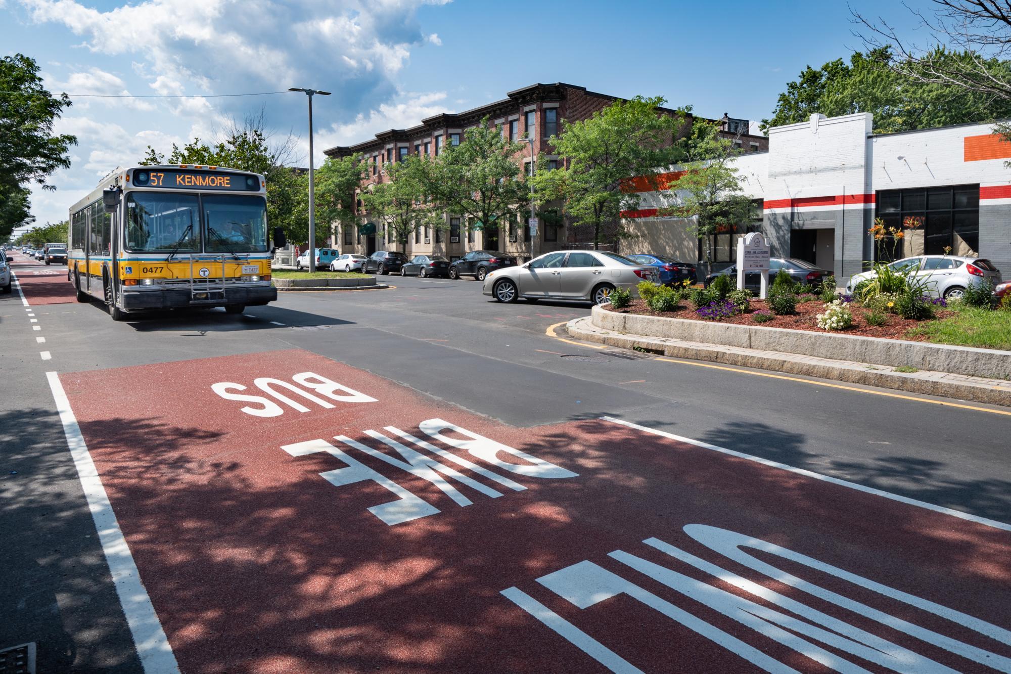 The 57 bus travels in a dedicated bus and bike lane on Brighton Ave in Allston. (July 2019)