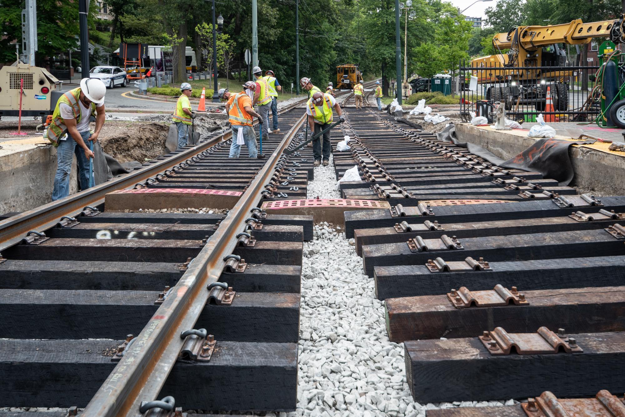 Crews work on the Green Line C branch tracks