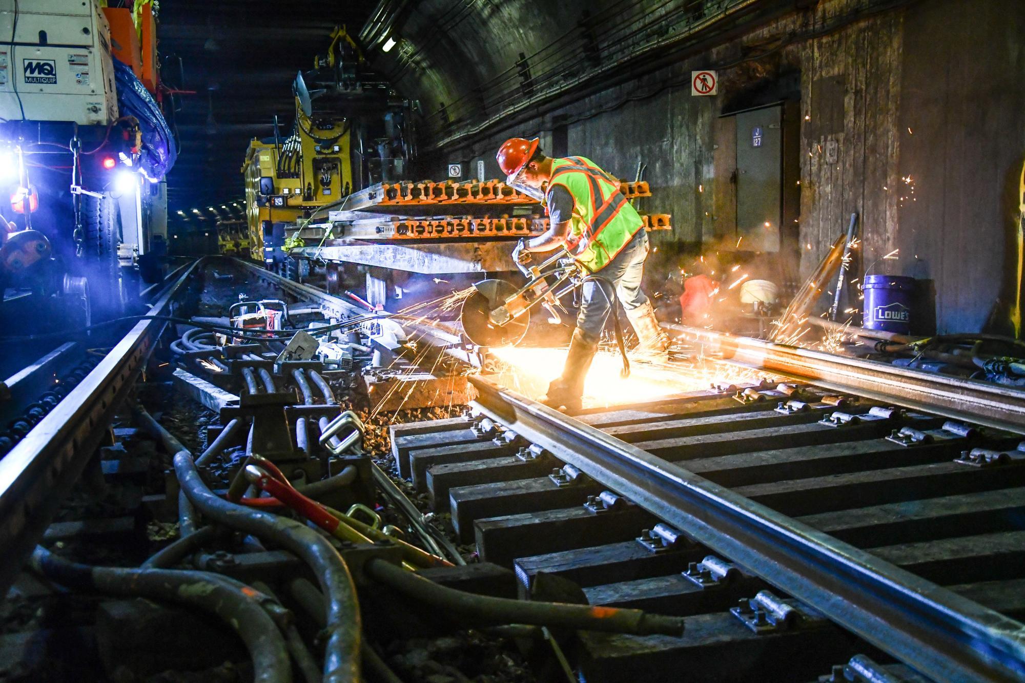 A crew works on track replacement at Downtown Crossing during the October  11 - 13, 2019, weekend shutdown.