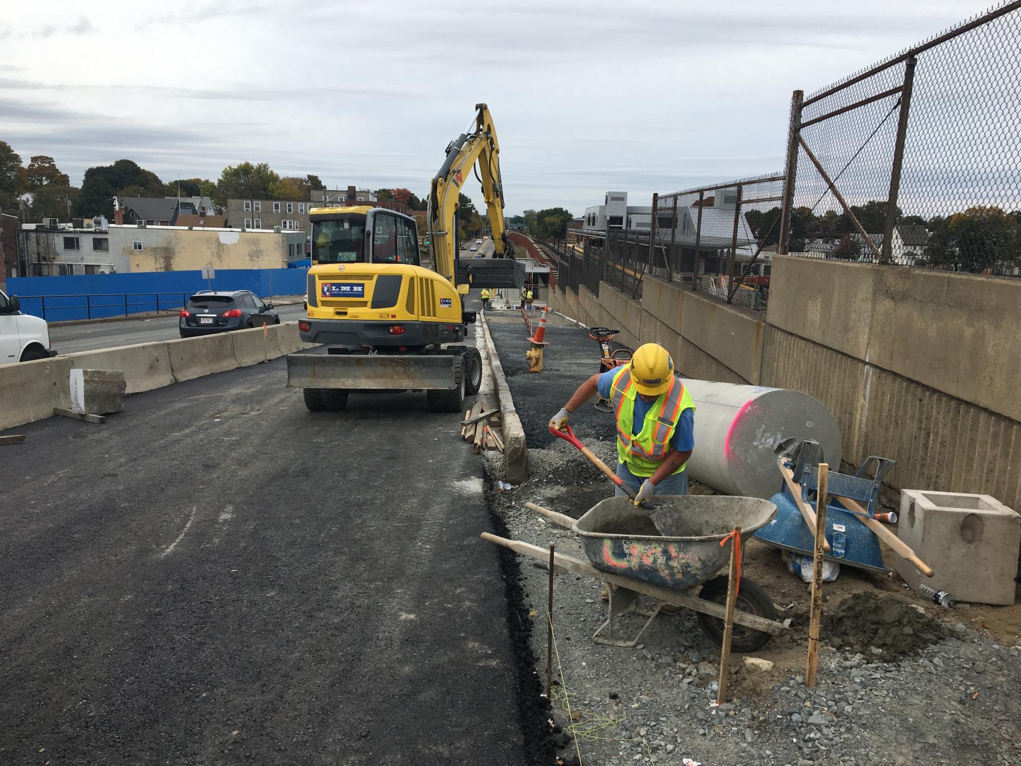 New sidewalk construction at Wollaston Station looking northbound (October 2019)