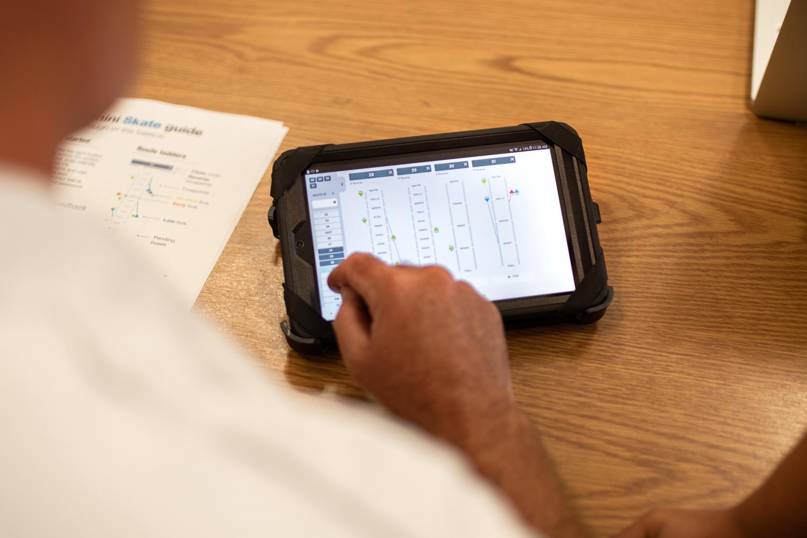 A bus inspector uses Skate, a mobile dispatching app for tablets that we built in-house