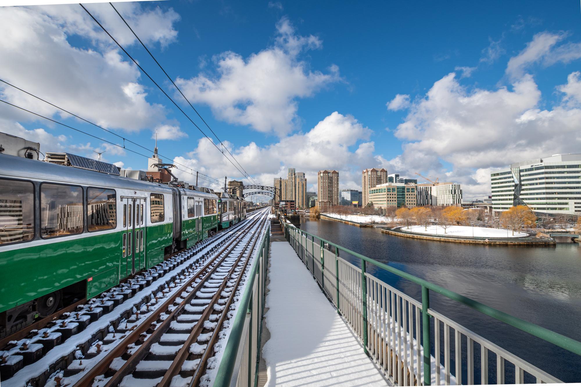 Green Line train crosses the Charles River between Science Park and Lechmere.