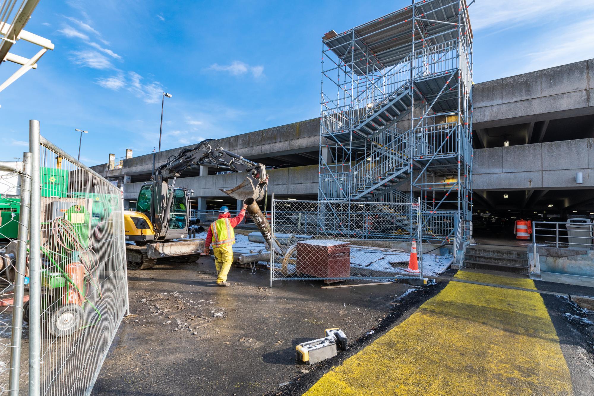 A crew member works on the Braintree Garage as part of the South Shore Garages project (January 8, 2020)