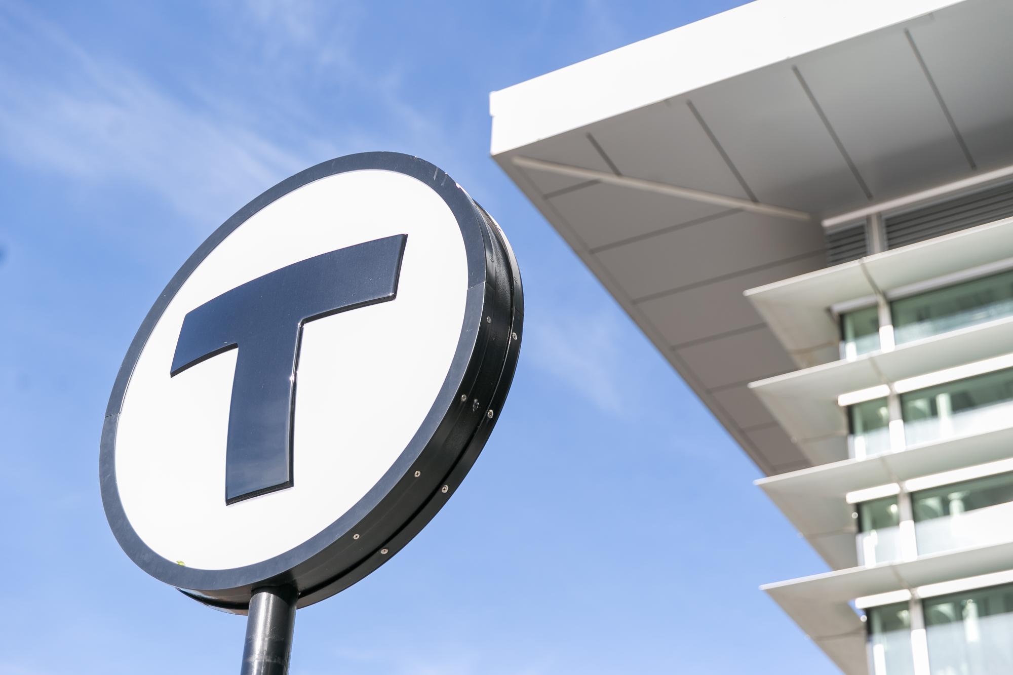 An angled shot of a T logo sign