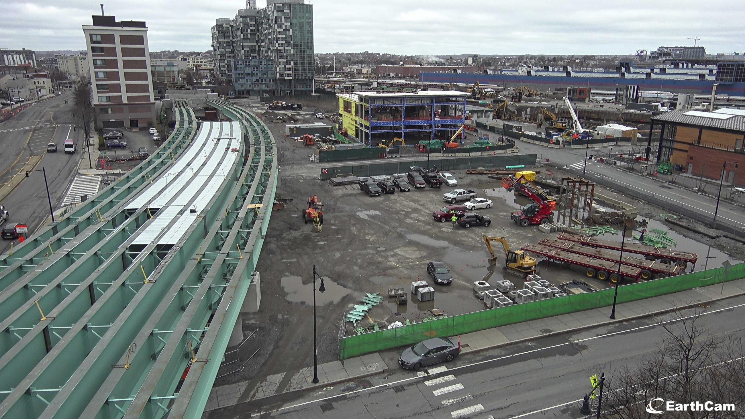 A view of the Lechmere Viaduct stretching north from Boston, with framing for the relocated Lechmere Station on the right