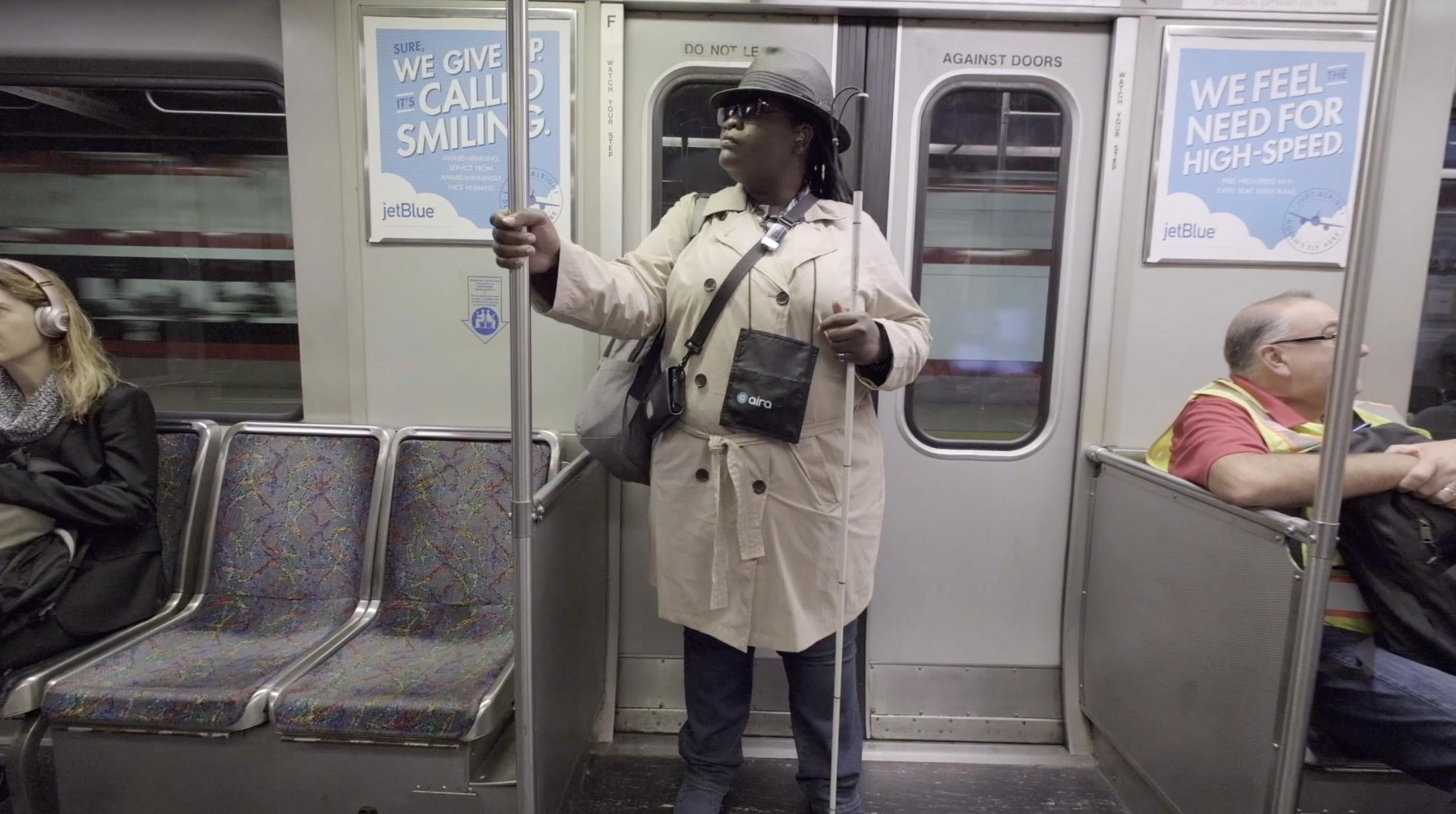A subway rider participates in a pilot for Aira, an assistive technology for blind and low-vision riders