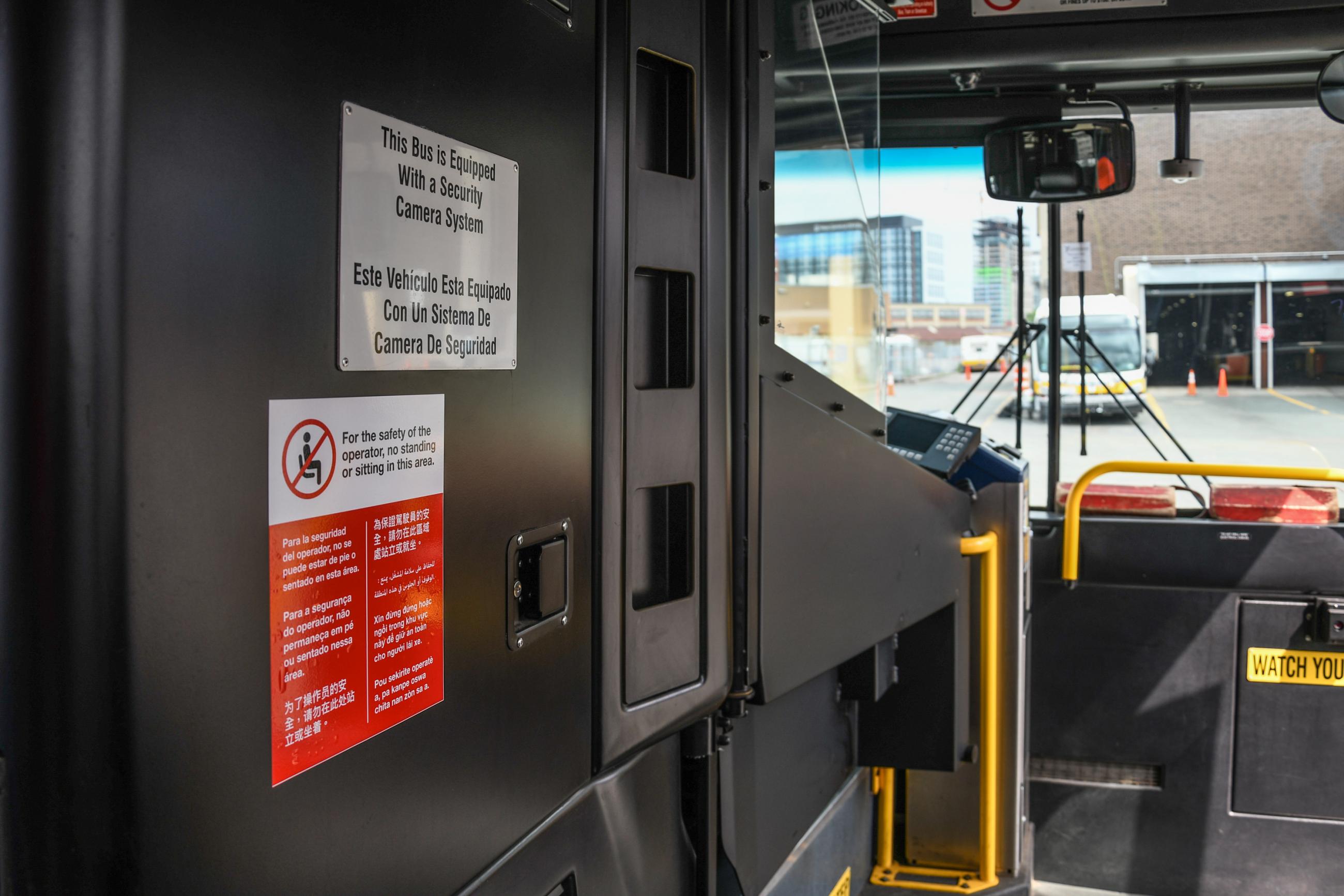 Photo of Protective Barrier on Bus with Decal