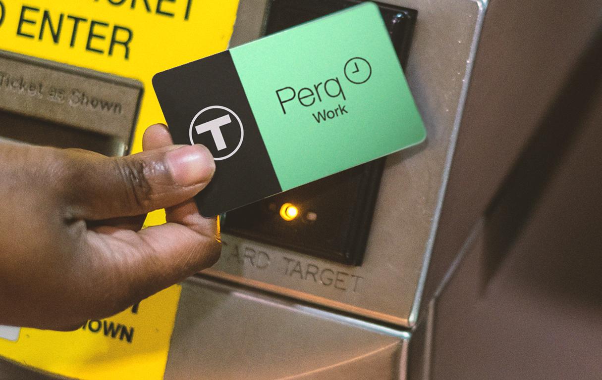 A rider tapping a Perq card at a fare gate