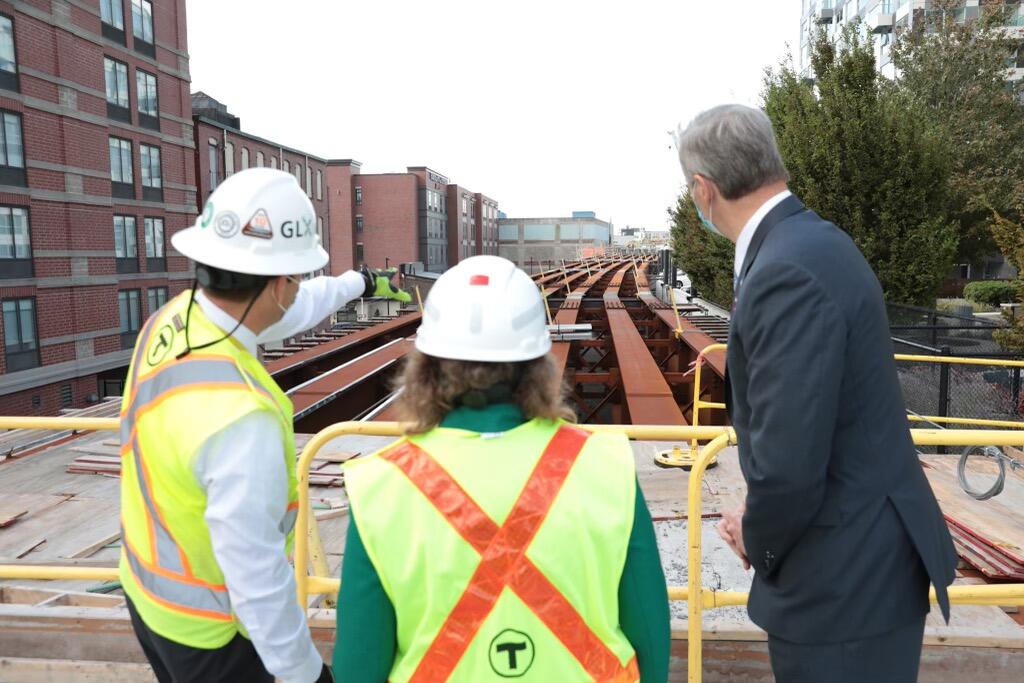 GLX Project Manager John Dalton shows Transportation Secretary and CEO Stephanie Pollack and Governor Charlie Baker GLX construction progress.