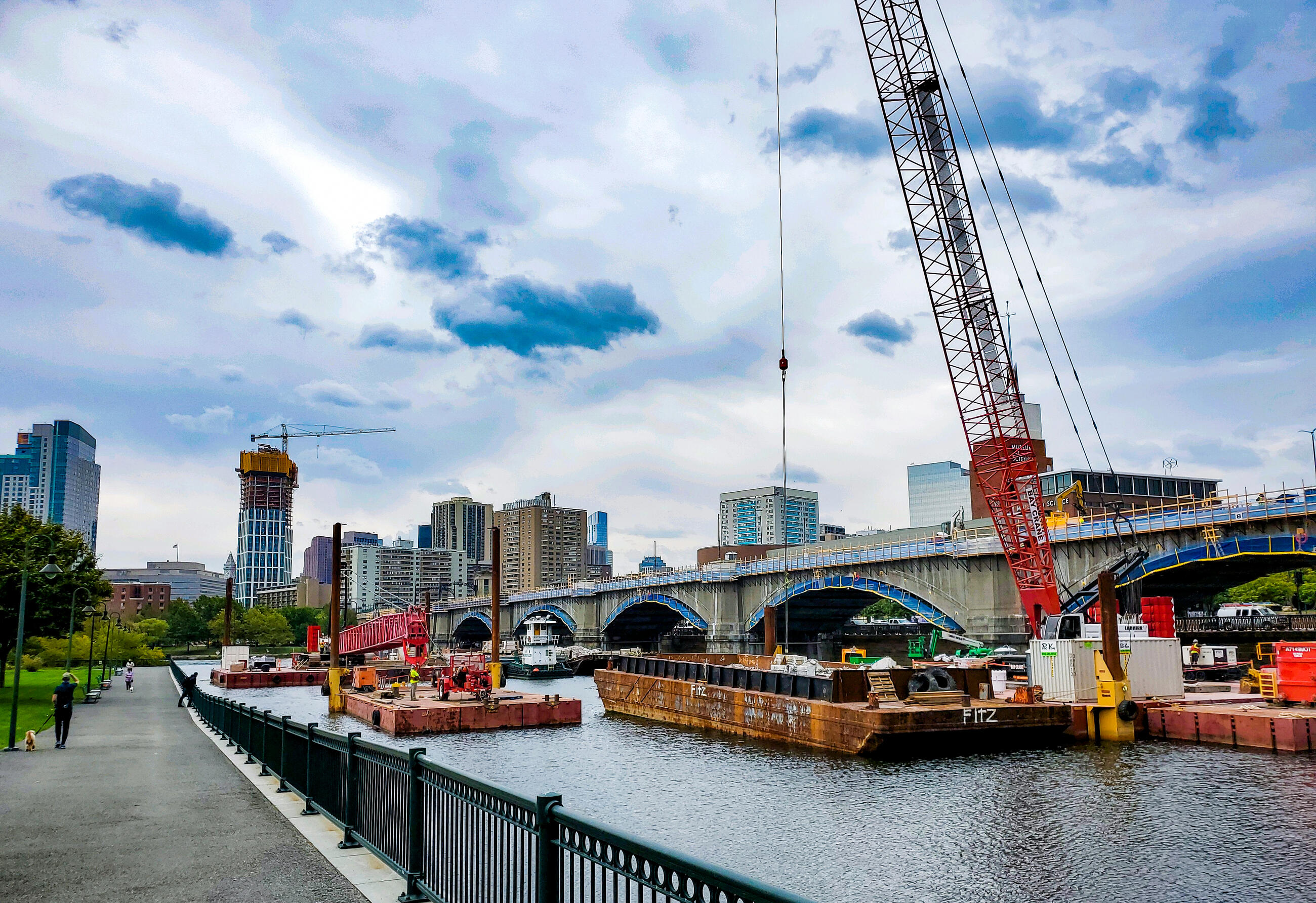 Cranes lift materials onto the Lechmere Viaduct as crews work on the rehabilitation project (October 2020)