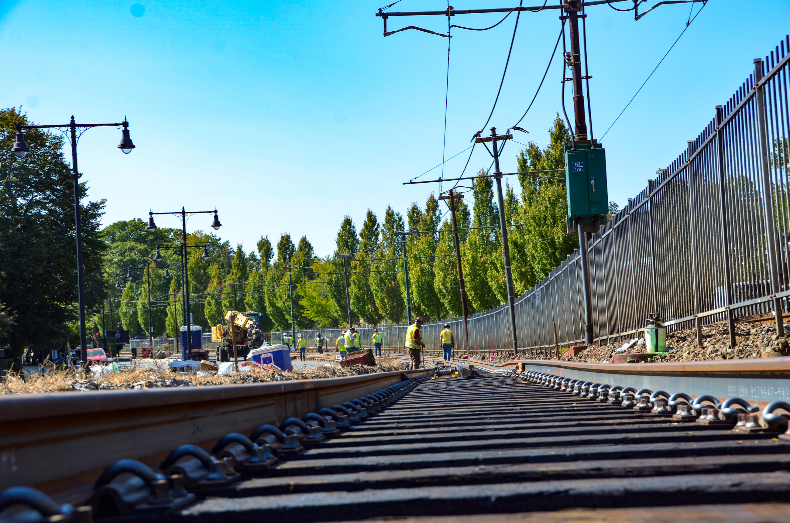A crew works on B Branch track and intersection upgrades as part of the Green Line Transformation (October 2020)