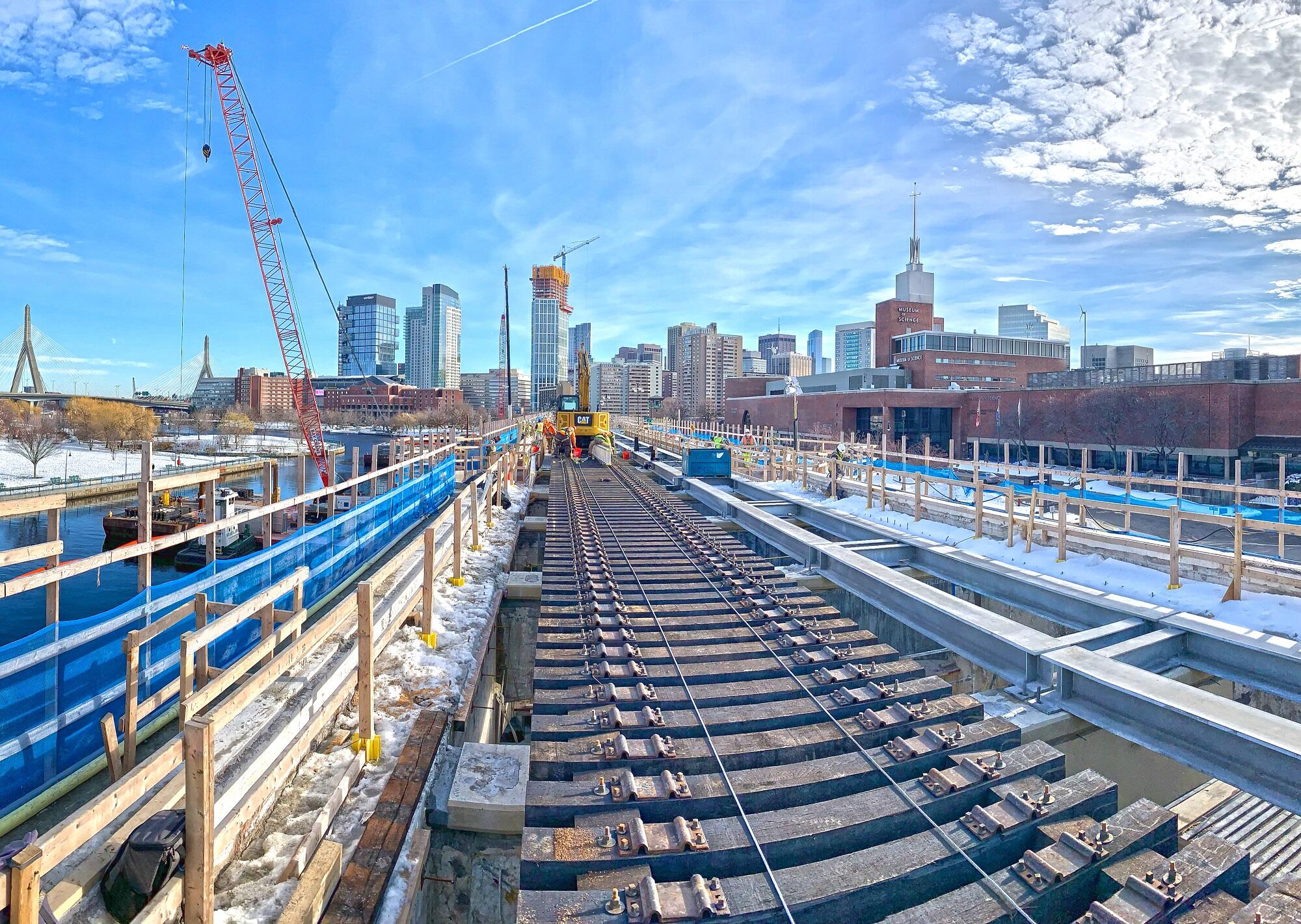 Crews work on rail ties along the Lechmere Viaduct (January 15, 2021)