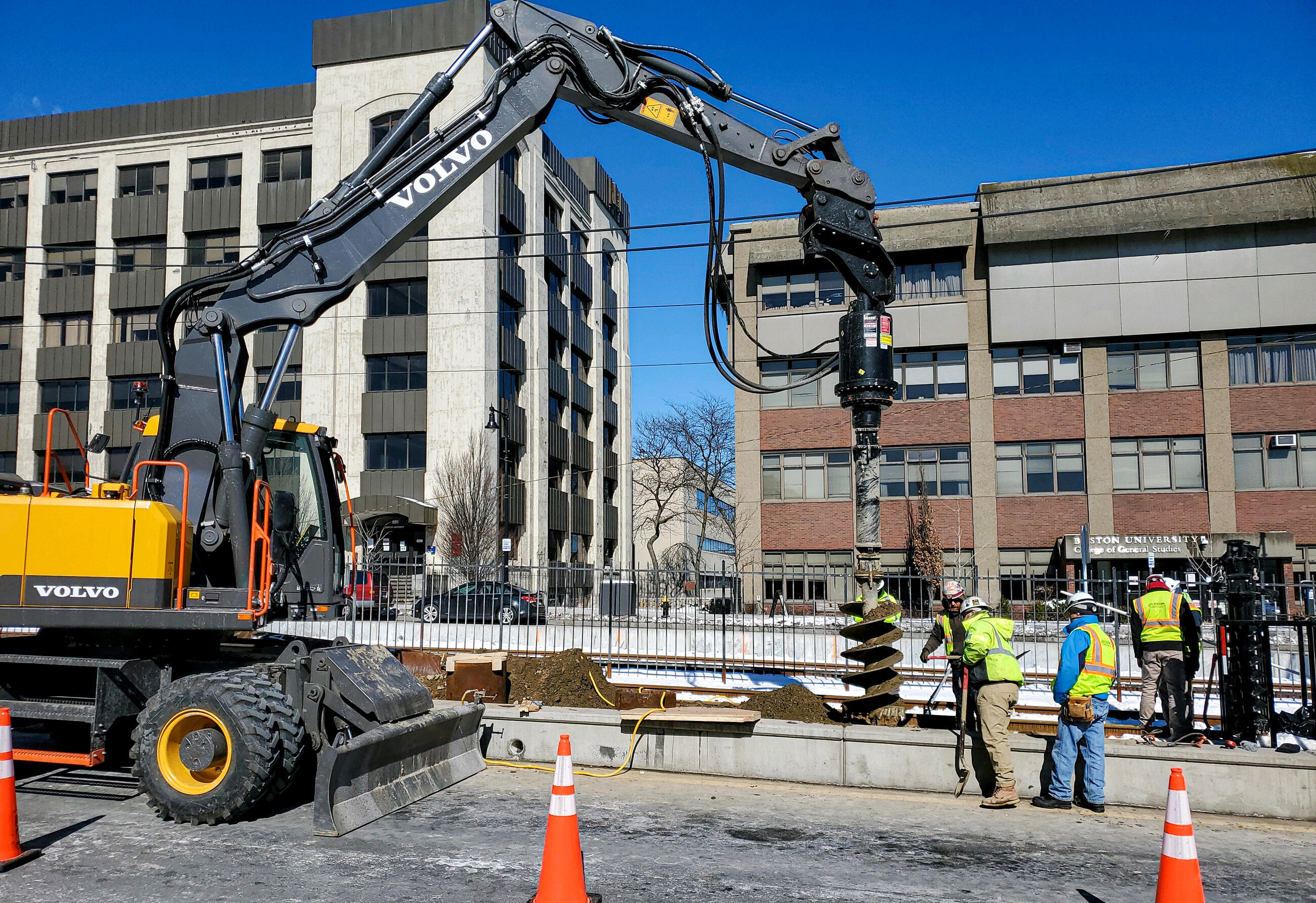 Crews drill shafts along Commonwealth Ave as part of B Branch Consolidation work