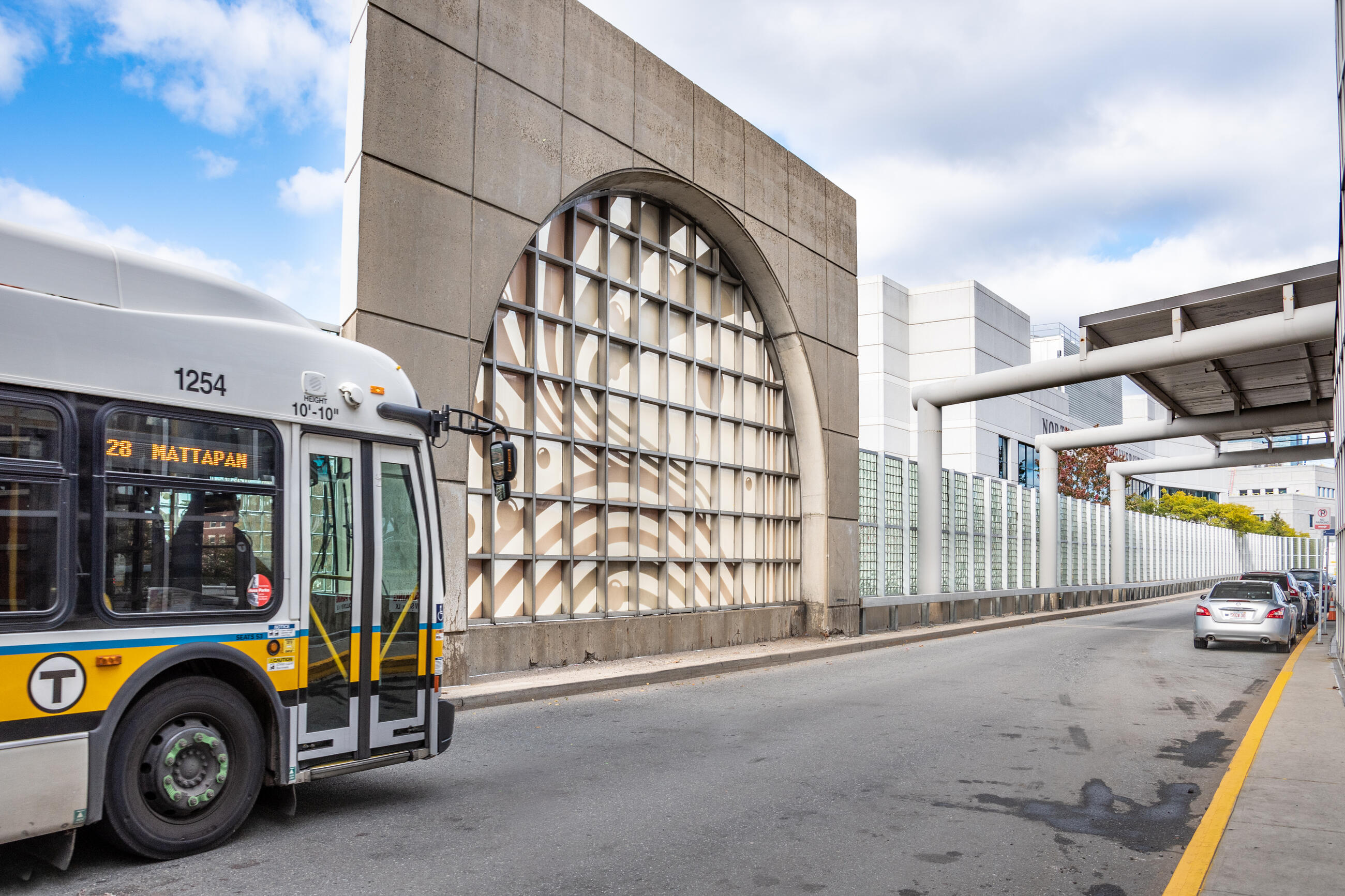 Route 28 bus enters Ruggles Station. 