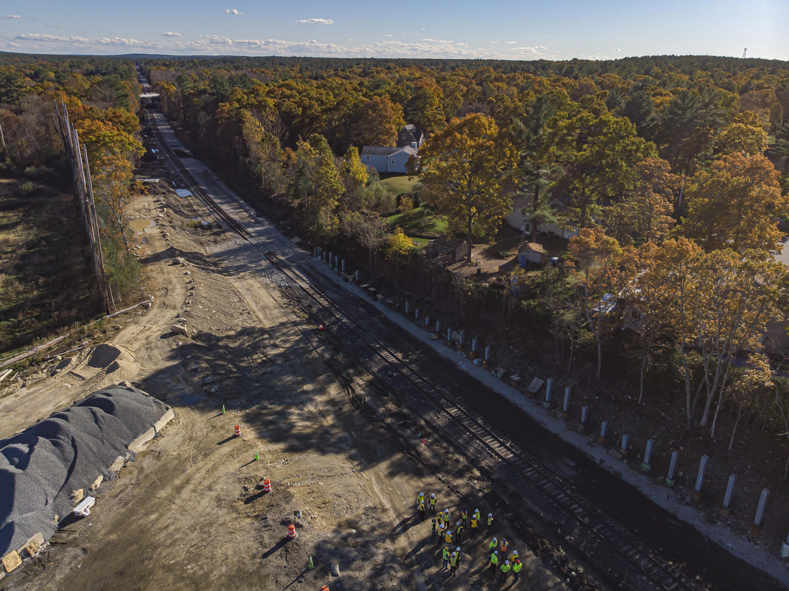 An aerial photo of rail tracks in the forest, showing Taunton Depot under construction
