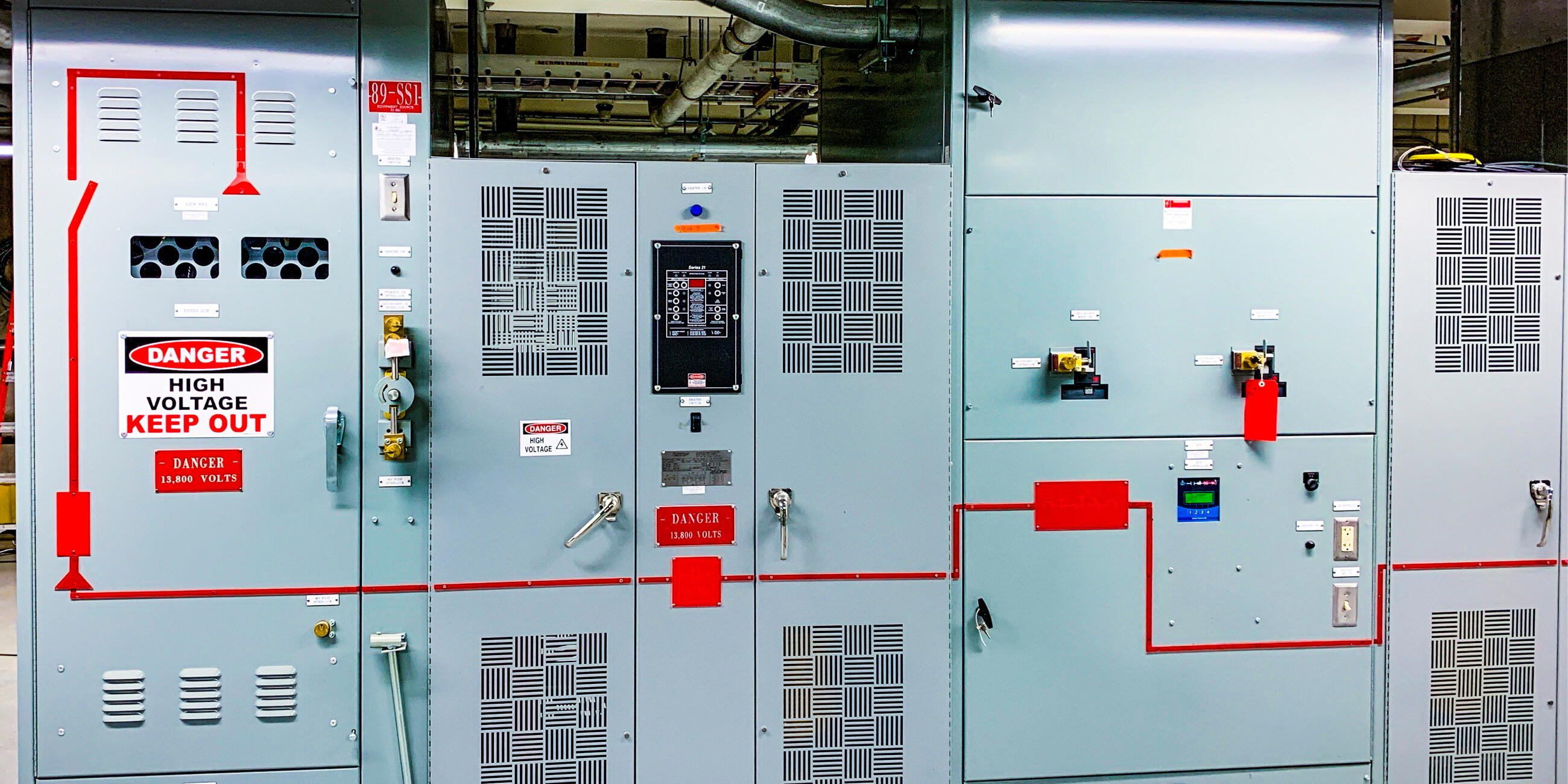 A photo of electrical panels in a traction power substation