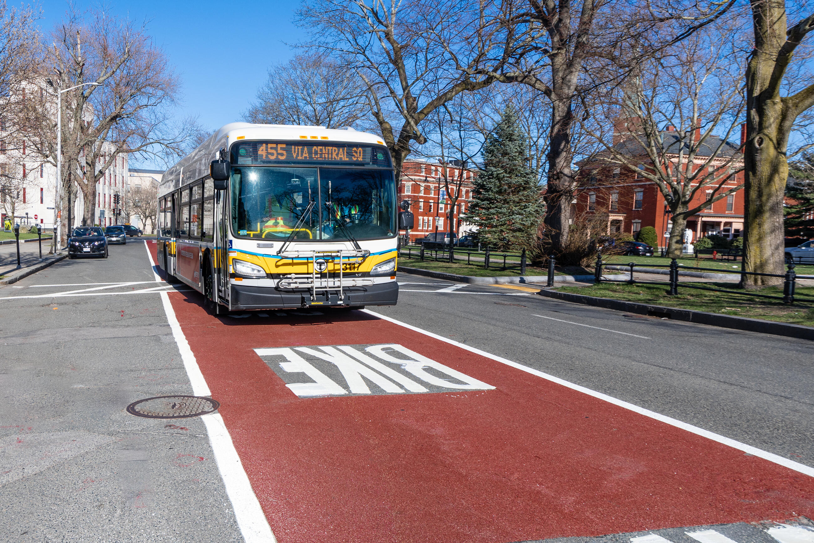 A Route 455 bus travels along the new shared bus-bike lane on North Common St in Lynn, which was completed in partnership with the City of Lynn in 2021. 
