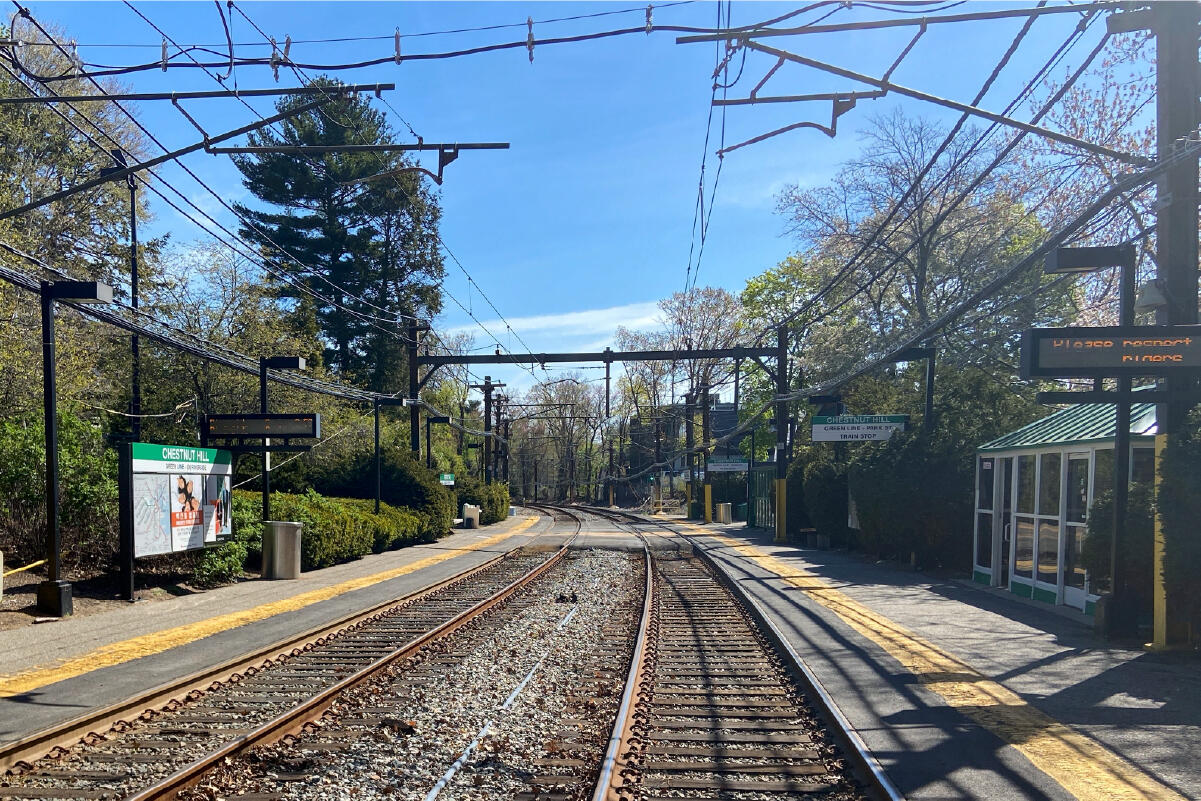 empty tracks in front of Chestnut Hill station on a sunny spring day