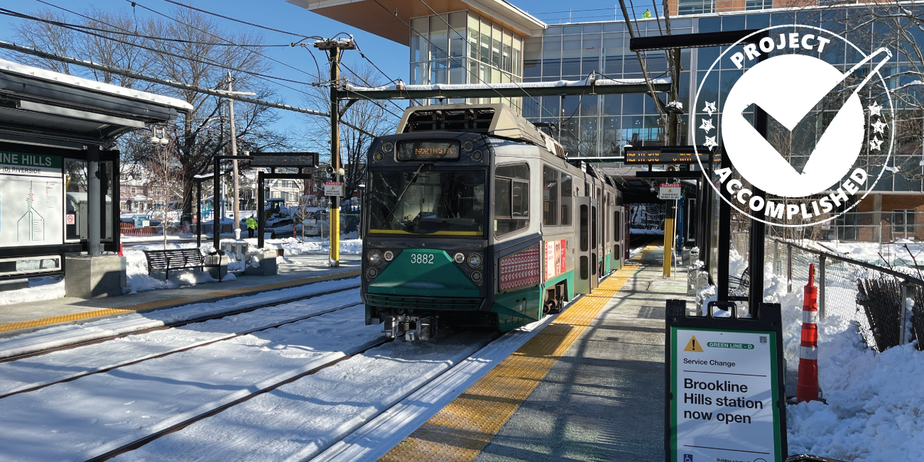 a green line trolley at brookline hills station in the snow