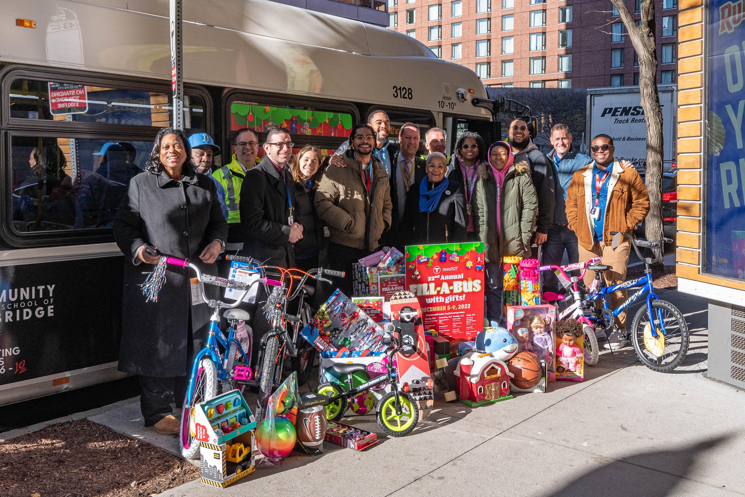 MBTA General Manager Poftak was today joined by T staff, including Event Organizer and MBTA Graphics Design Manager David Wood and MBTA Holiday Bus Route Operator Mike Broderick, for the final stop of the 22nd annual Fill-A-Bus with Gifts holiday drive at the State Transportation Building in Boston.