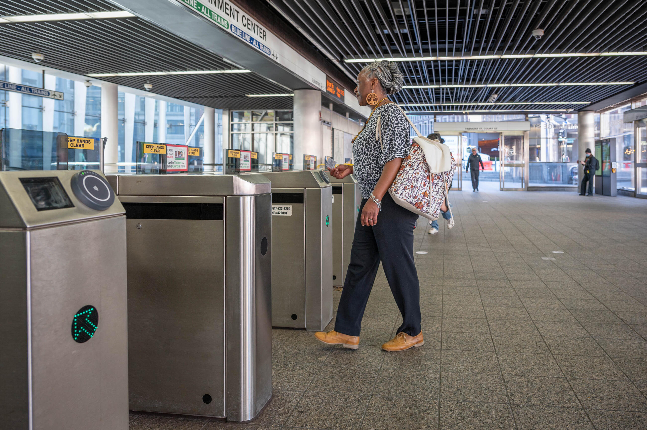 Rider entering fare gate