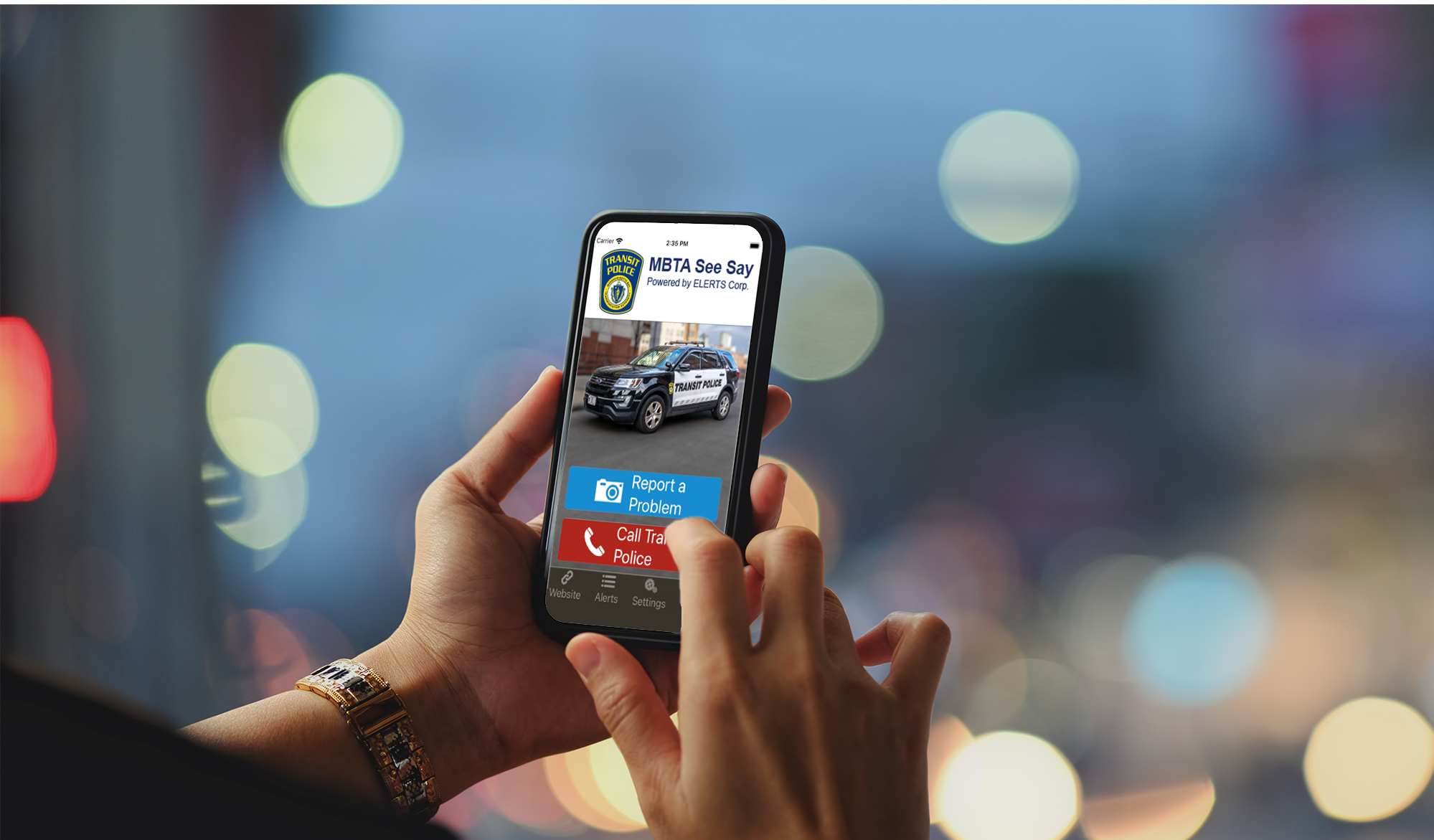 A close up of a person's cellphone in their hands while using the MBTA See Say app