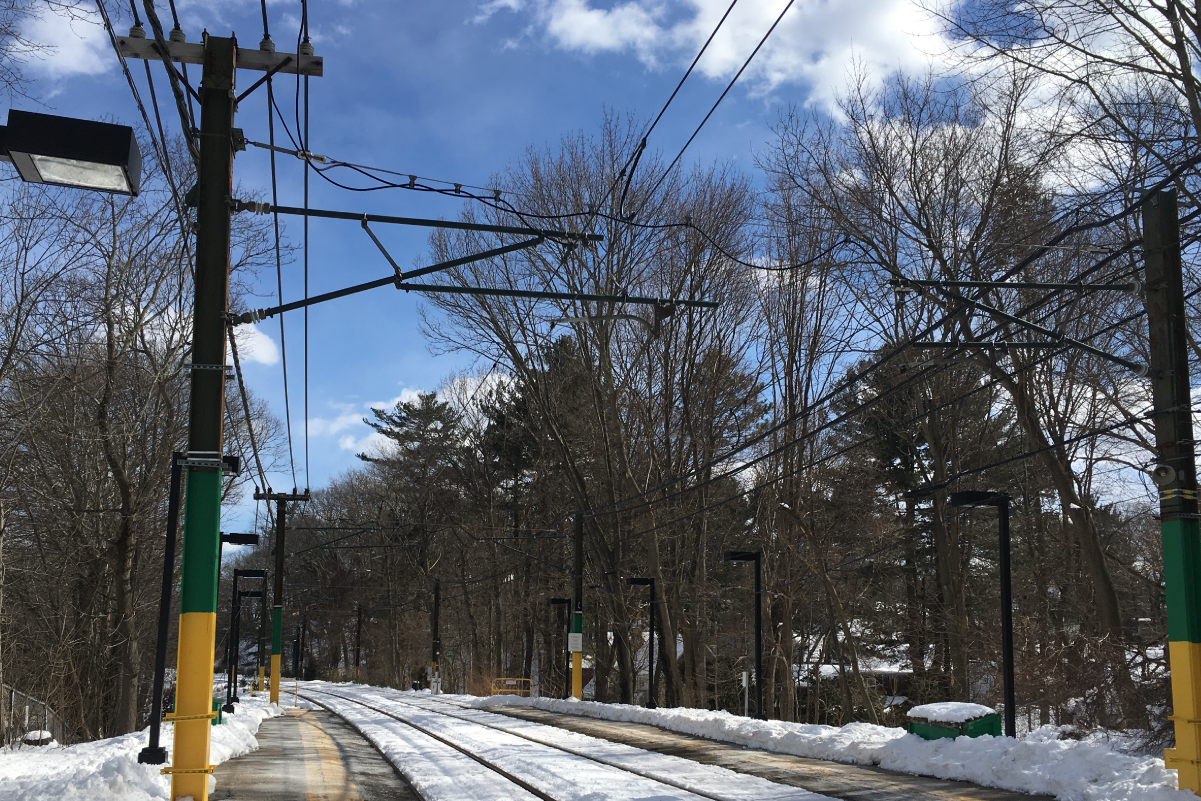 green line waban station tracks in the snow