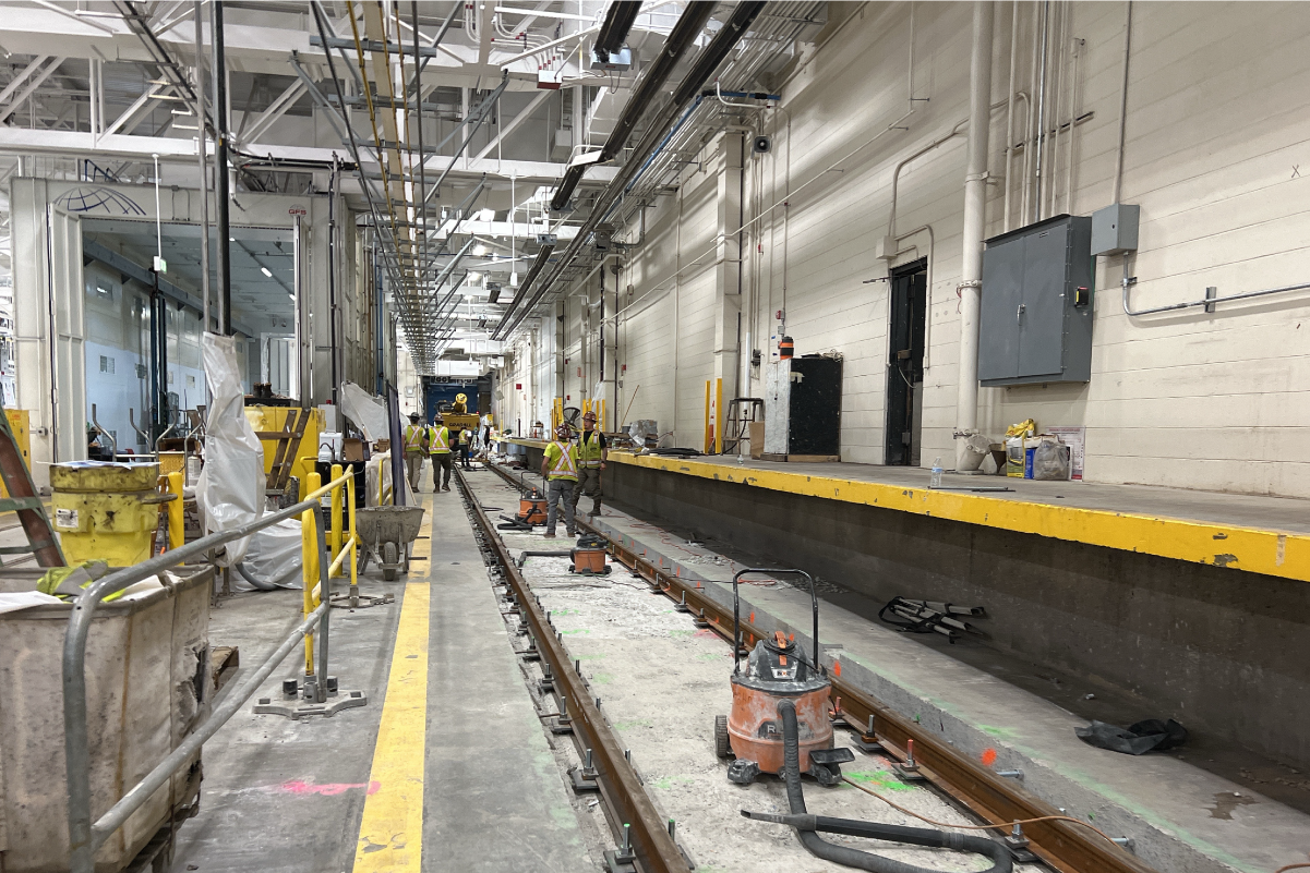 Work inside track vehicle maintenance facility