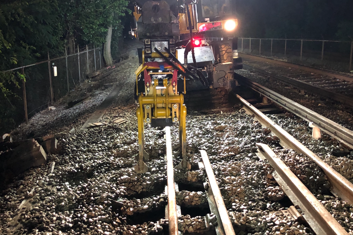 equipment working on tracks at night