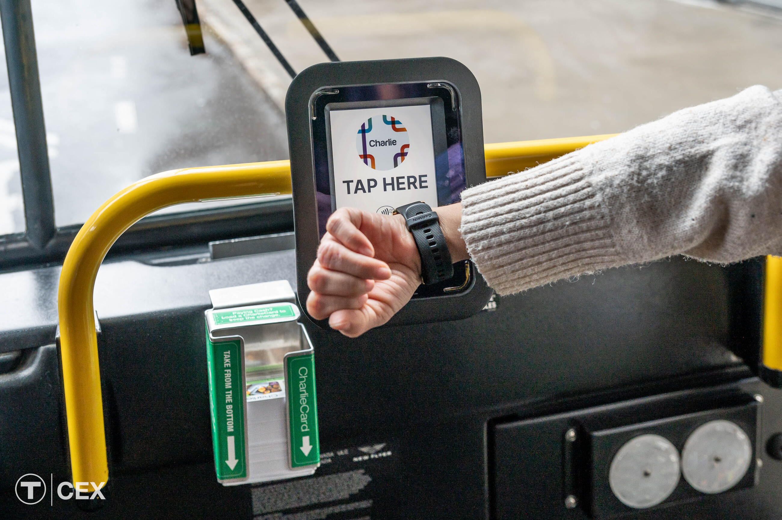 Contactless watch on bus fare reader.