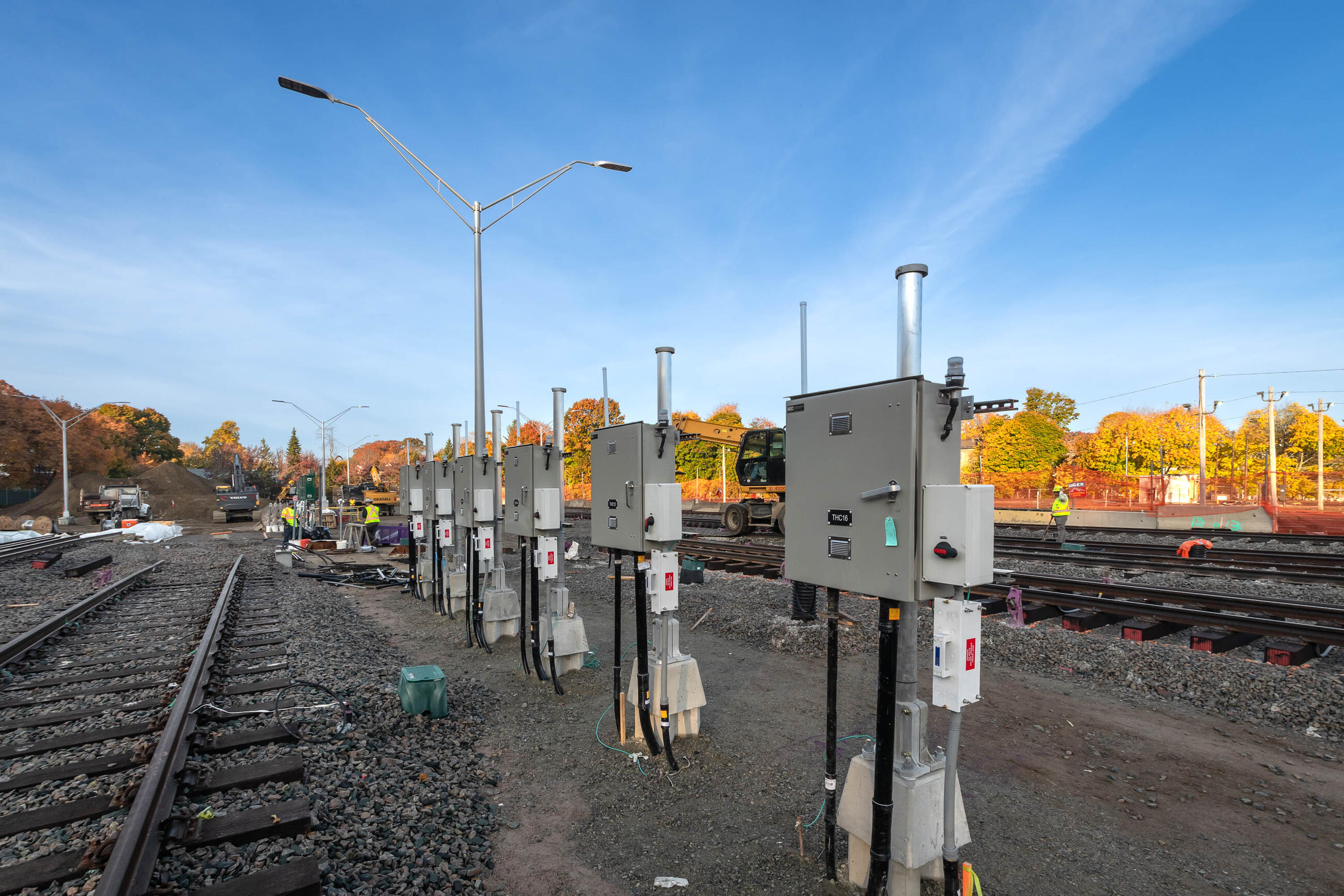 The Codman Yard work zone with fall foliage in the background