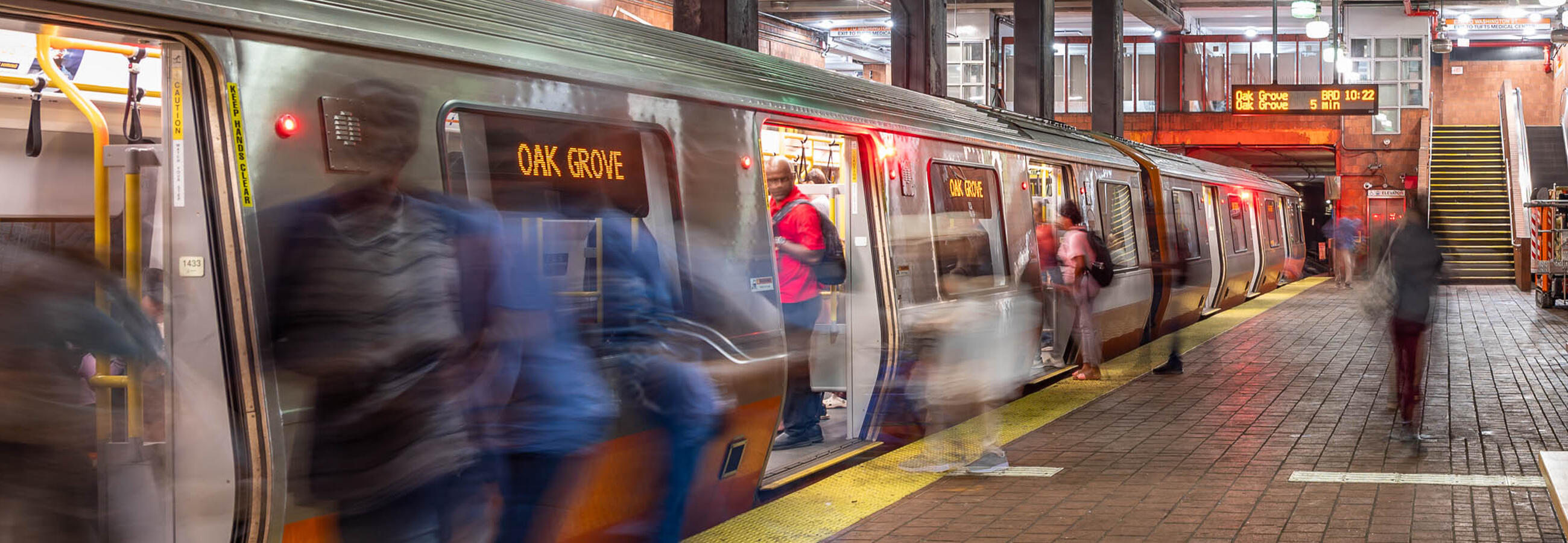 Riders entering subway car