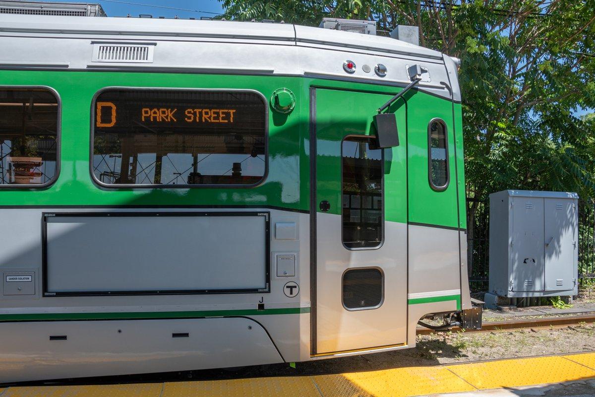 A new Green Line car at Riverside Station, profile view of the door