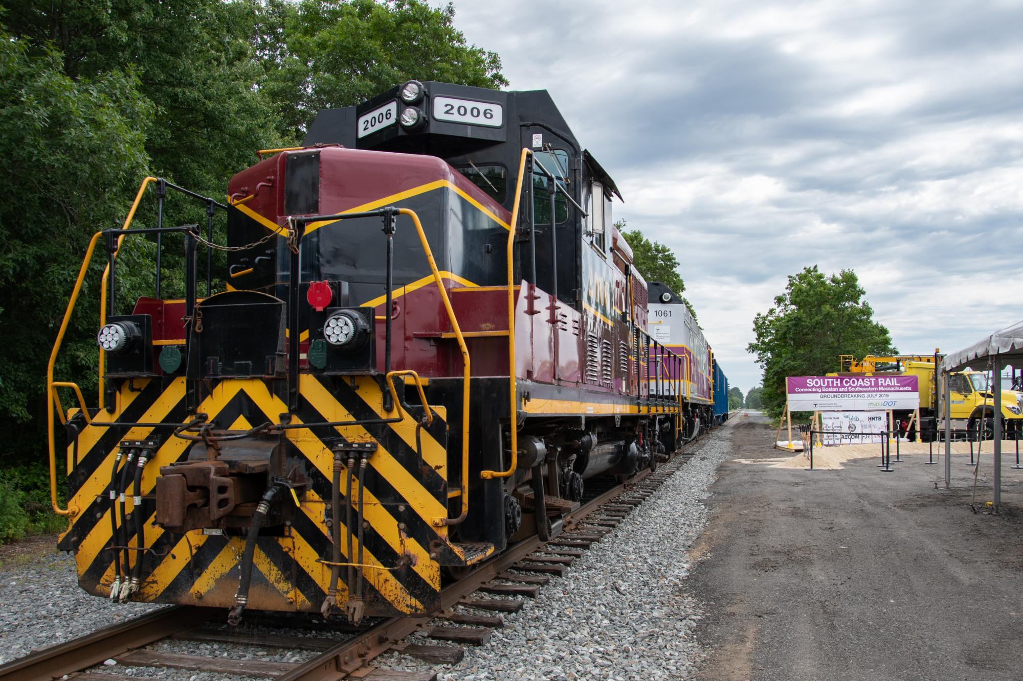 Locomotive on the tracks at South Coast Rail groundbreaking in Freetown