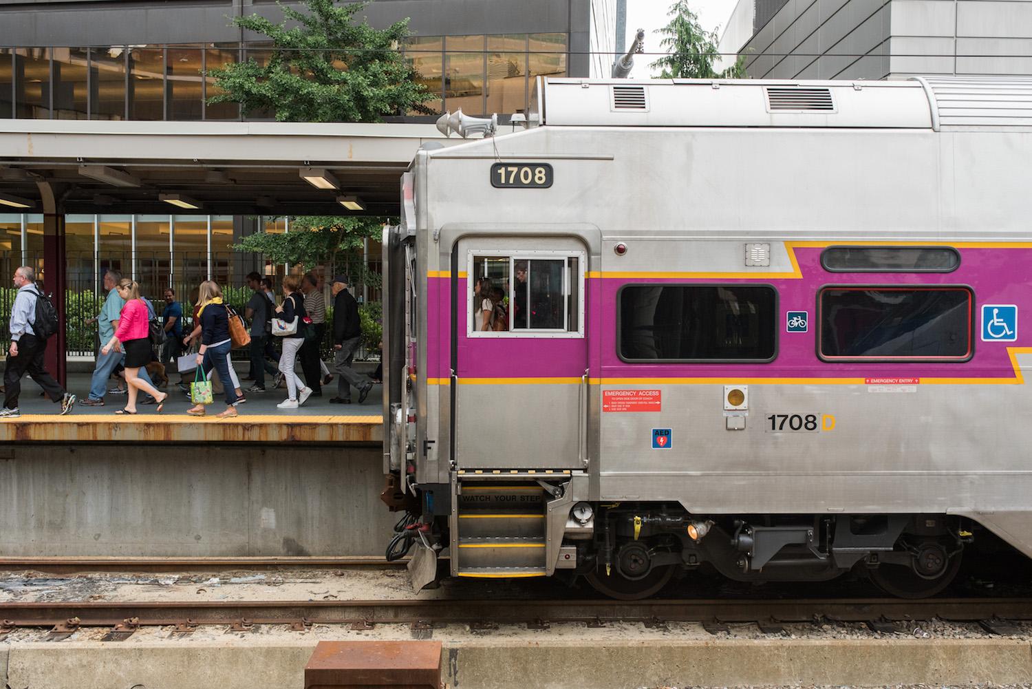 Commuter Rail train at South Station, with passengers disembarking