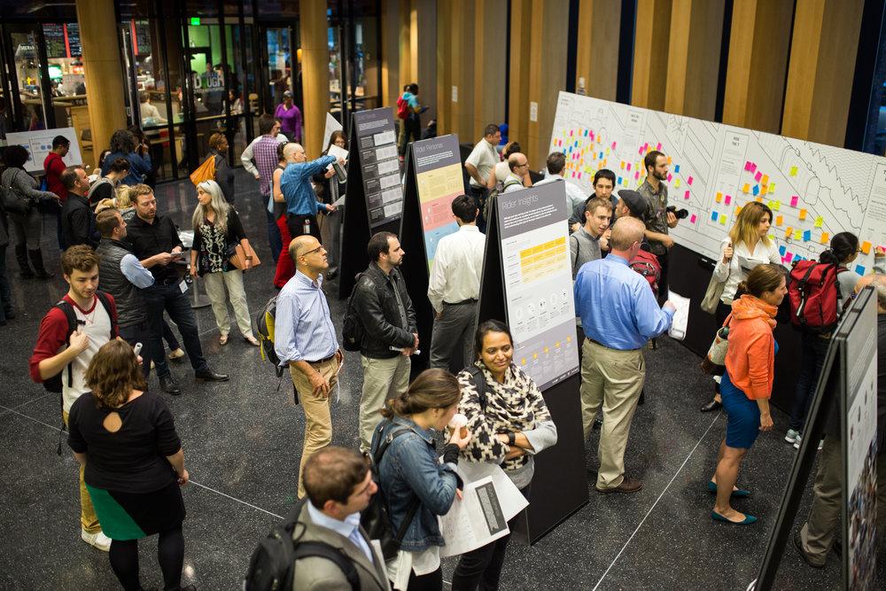The open house, held at the Bolling Building in Dudley Square, presented preliminary goal statements, potential future scenarios, and upcoming MBTA investments for public feedback.