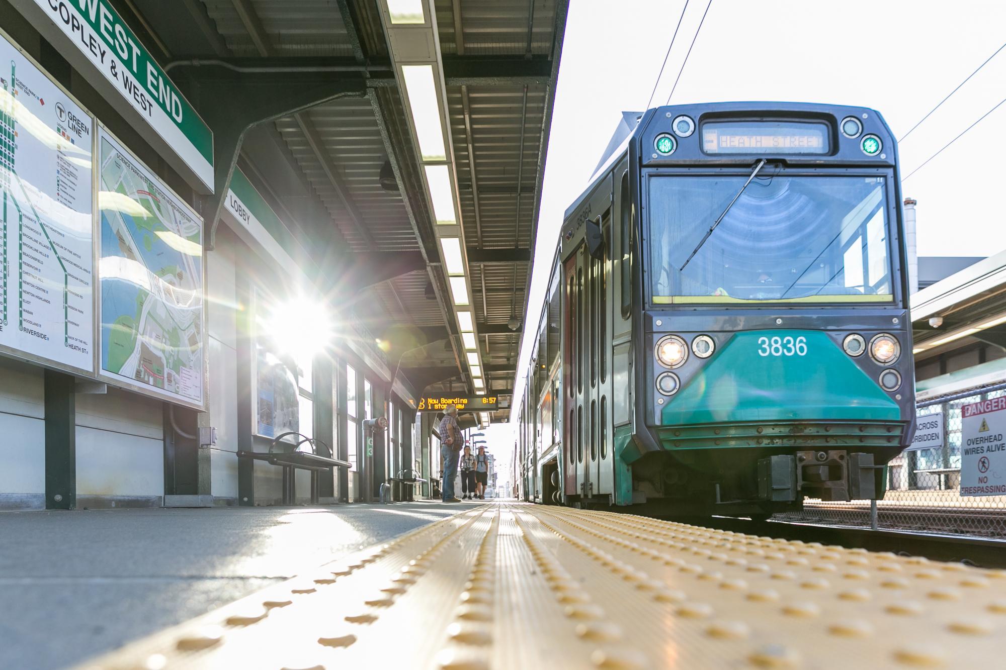 Green Line train pulling into the Science Park/West End Station