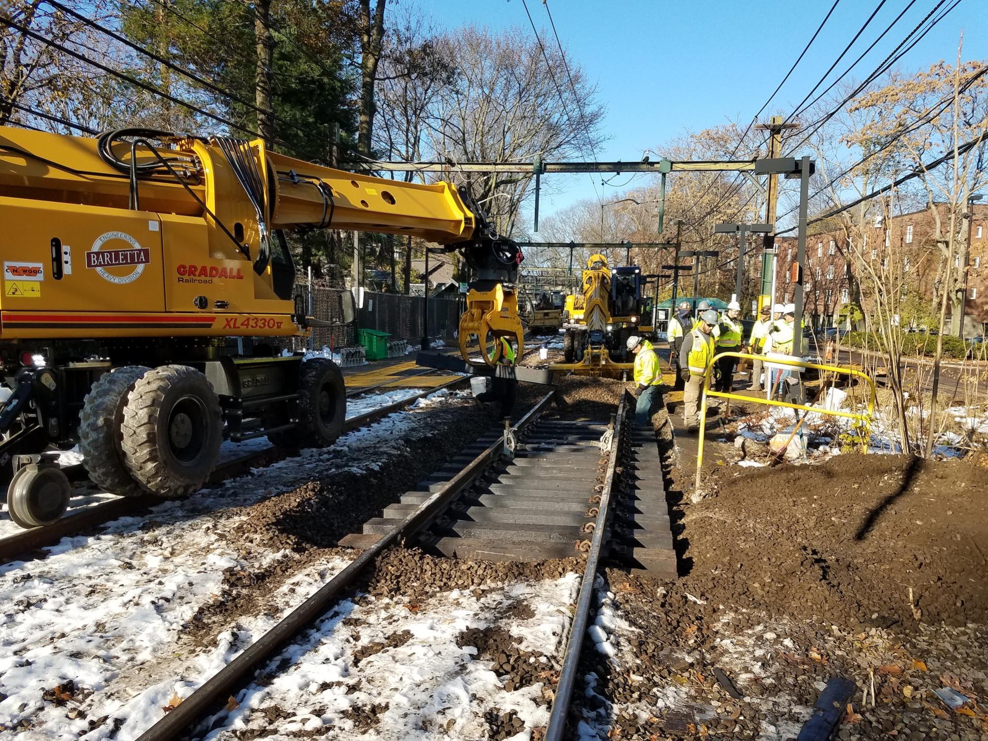 Placing new railroad ties along the D Branch (November 2018)