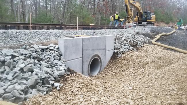 A crew works on culvert installation in Lakeville as part of the South Coast Rail project (May 2020)